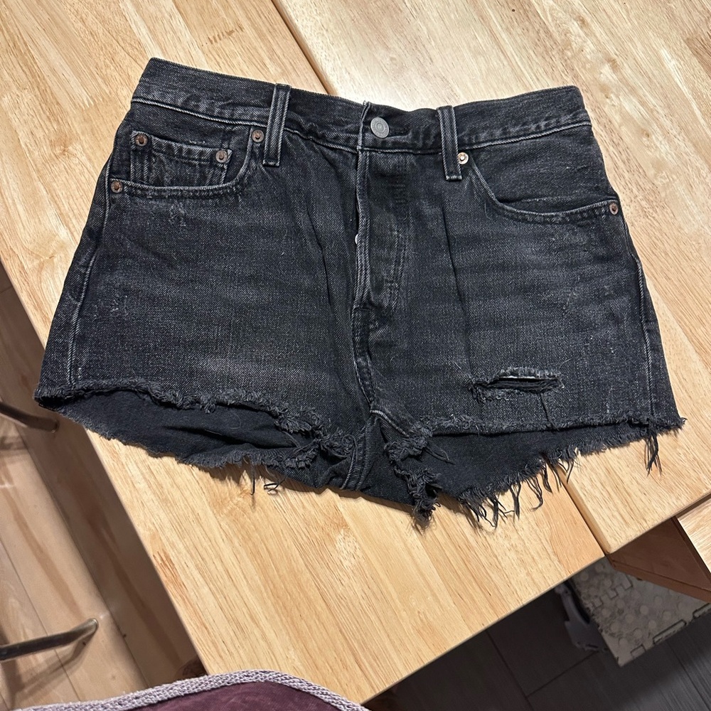 Levi’s 501 Black High Waisted Distressed Denim Shorts